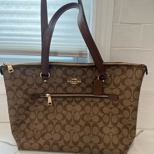Authentic used once coach bag in excellent like new condition